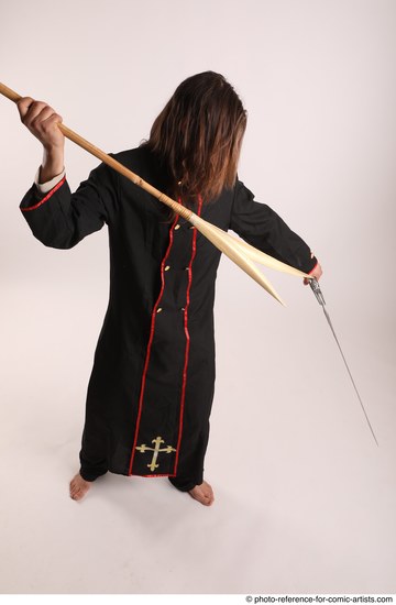 Man Adult Average White Fighting with sword Standing poses Coat