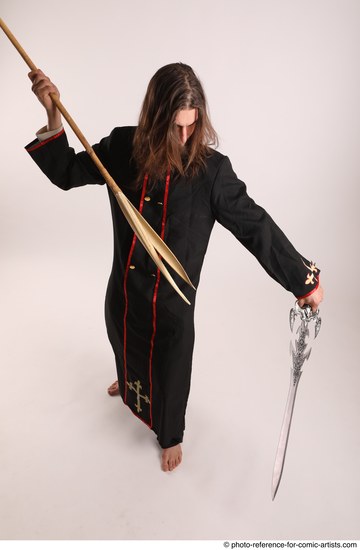 Man Adult Average White Fighting with sword Standing poses Coat