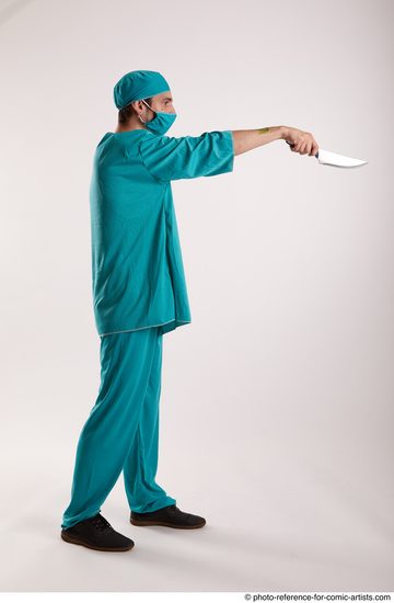 Man Adult Average White Fighting with knife Standing poses Casual