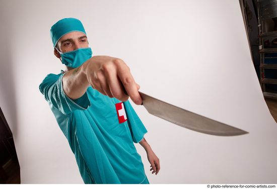 Man Adult Average White Fighting with knife Standing poses Casual