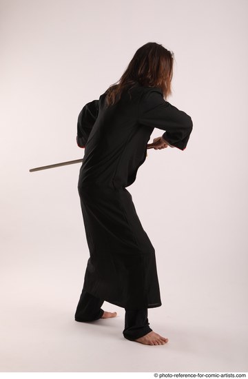 Man Adult Average White Fighting with sword Standing poses Coat