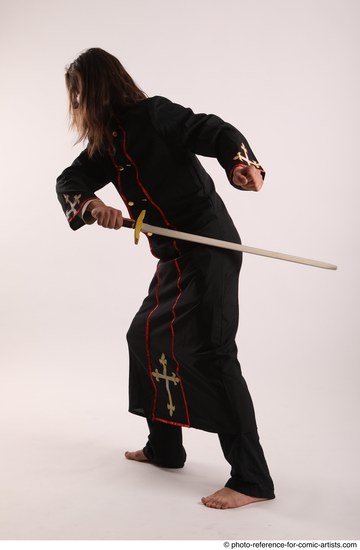 Man Adult Average White Fighting with sword Standing poses Coat