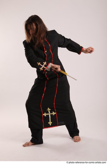 Man Adult Average White Fighting with sword Standing poses Coat