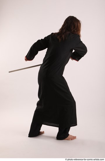 Man Adult Average White Fighting with sword Standing poses Coat