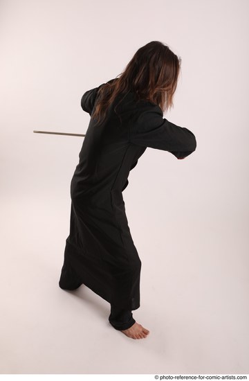 Man Adult Average White Fighting with sword Standing poses Coat