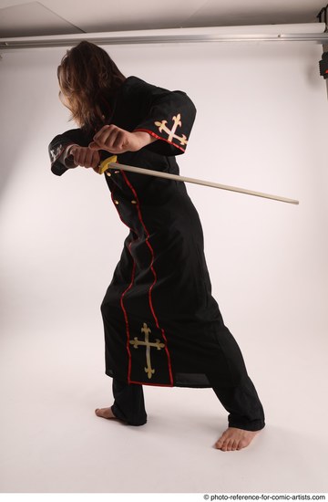 Man Adult Average White Fighting with sword Standing poses Coat