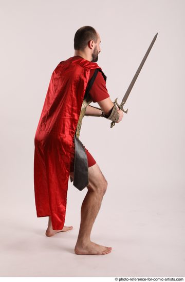 Man Adult Average White Fighting with sword Standing poses Casual