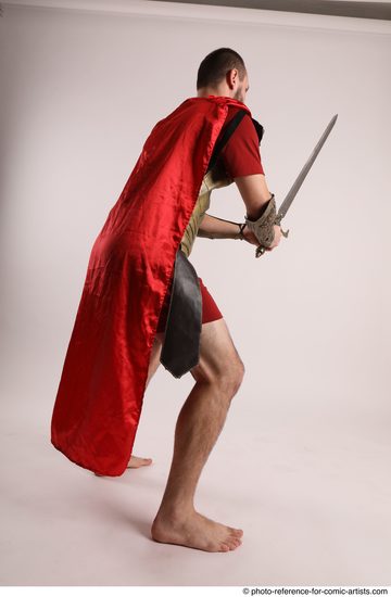 Man Adult Average White Fighting with sword Standing poses Casual