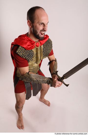 Man Adult Average White Fighting with sword Standing poses Casual