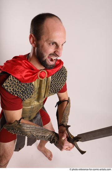 Man Adult Average White Fighting with sword Standing poses Casual