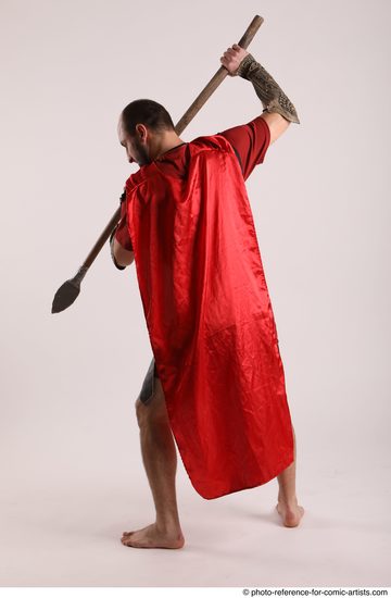 Man Adult Average White Fighting with spear Standing poses Casual