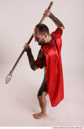 Man Adult Average White Fighting with spear Standing poses Casual