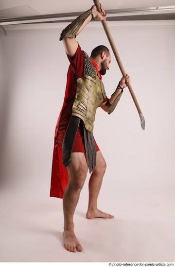 Man Adult Average White Fighting with spear Standing poses Casual