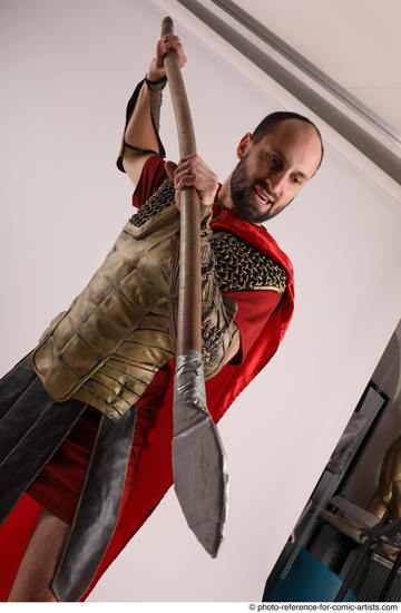 Man Adult Average White Fighting with spear Standing poses Casual