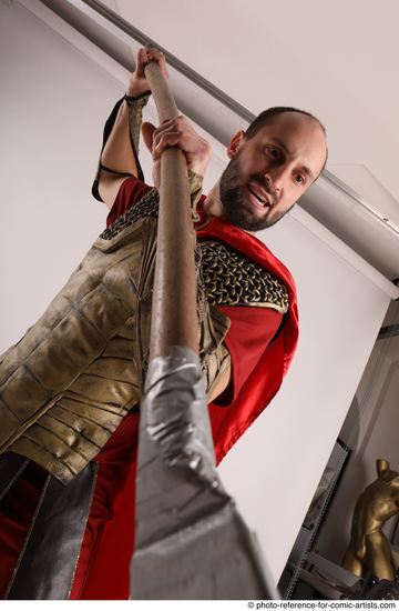 Man Adult Average White Fighting with spear Standing poses Casual