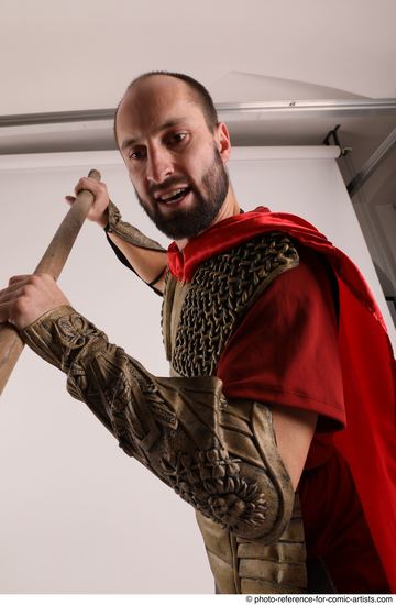 Man Adult Average White Fighting with spear Standing poses Casual