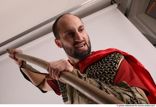 Man Adult Average White Fighting with spear Standing poses Casual