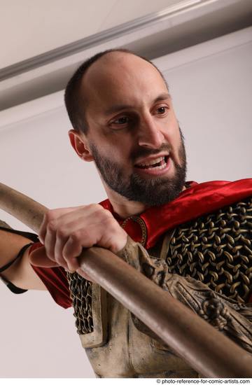 Man Adult Average White Fighting with spear Standing poses Casual