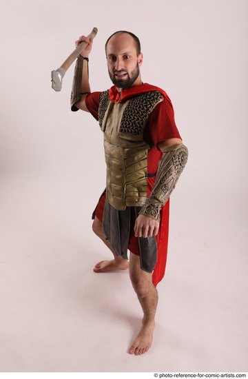 Man Adult Average White Fighting with spear Standing poses Casual