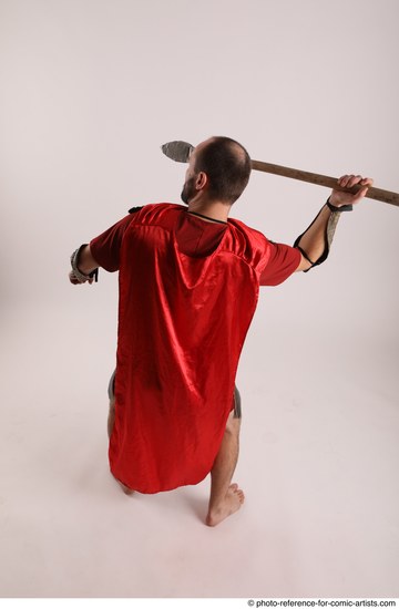 Man Adult Average White Fighting with spear Standing poses Casual