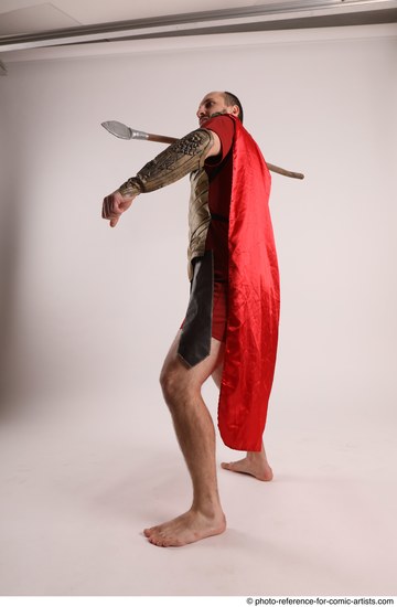 Man Adult Average White Fighting with spear Standing poses Casual