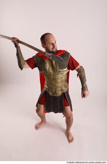 Man Adult Average White Fighting with spear Standing poses Casual