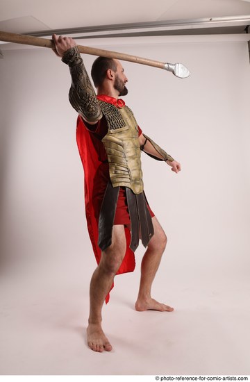 Man Adult Average White Fighting with spear Standing poses Casual