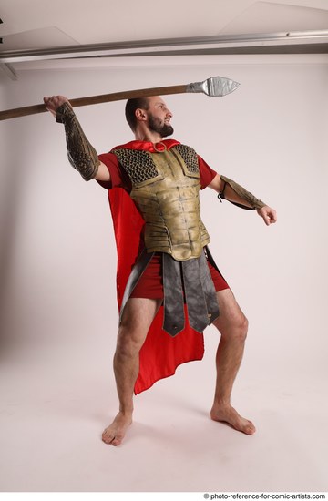 Man Adult Average White Fighting with spear Standing poses Casual