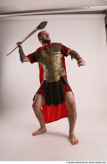 Man Adult Average White Fighting with spear Standing poses Casual