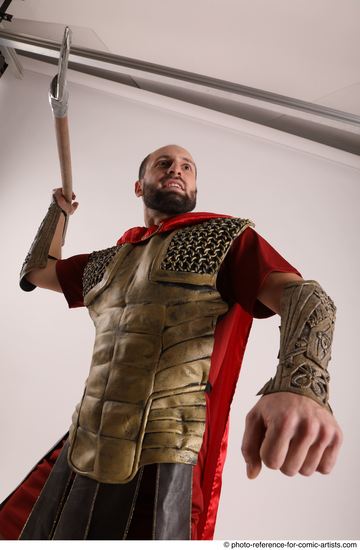 Man Adult Average White Fighting with spear Standing poses Casual