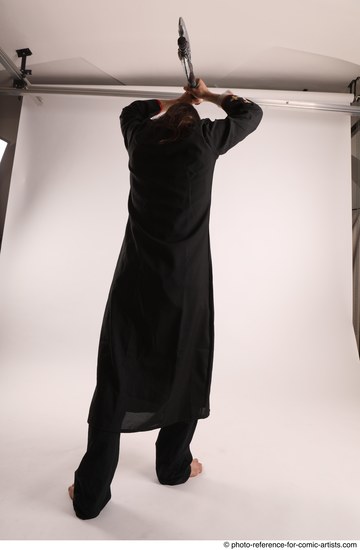 Man Adult Average White Fighting without gun Standing poses Coat