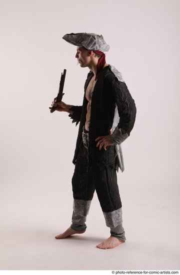 Man Adult Average White Fighting with gun Standing poses Coat