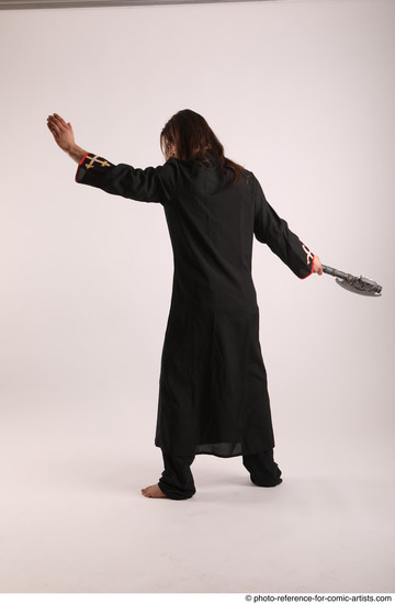 Man Adult Average White Fighting without gun Standing poses Coat