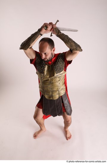 Man Adult Average White Fighting with sword Standing poses Casual