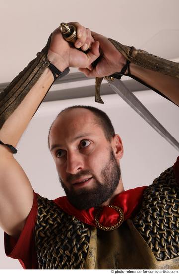 Man Adult Average White Fighting with sword Standing poses Casual