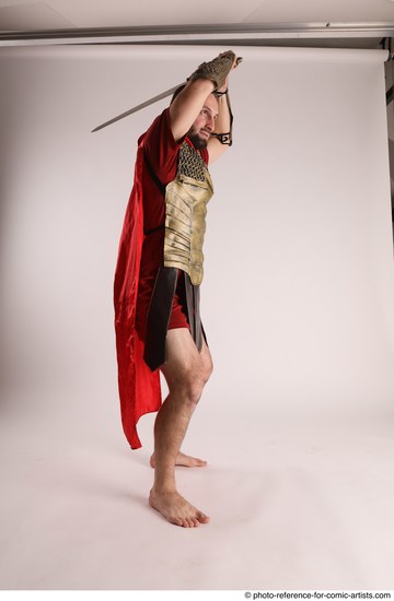 Man Adult Average White Fighting with sword Standing poses Casual