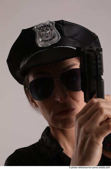 Woman Adult Average White Fighting with gun Standing poses Casual