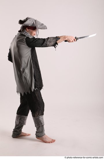 Man Adult Average White Fighting with sword Standing poses Casual