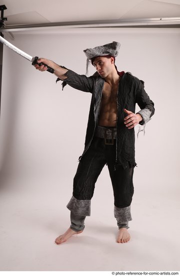 Man Adult Average White Fighting with sword Standing poses Casual