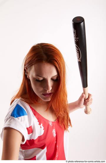 Woman Adult Athletic White Standing poses Casual Fighting with bat