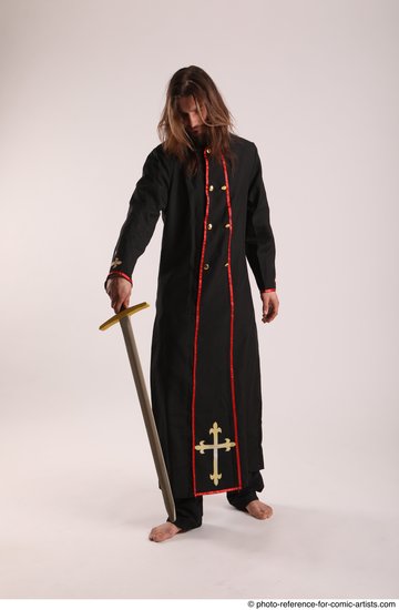 Man Adult Average White Fighting with sword Standing poses Coat