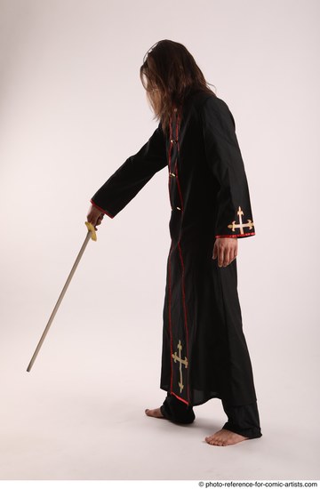 Man Adult Average White Fighting with sword Standing poses Coat