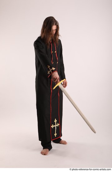 Man Adult Average White Fighting with sword Standing poses Coat