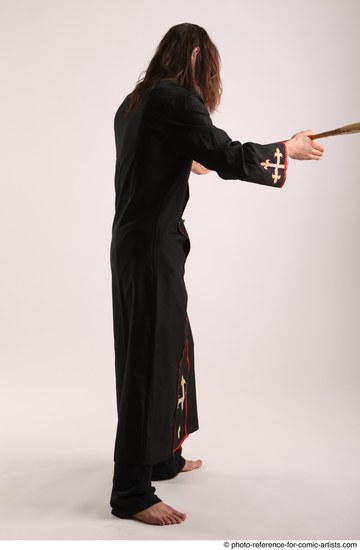 Man Adult Average White Fighting with spear Standing poses Coat