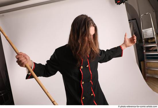 Man Adult Average White Fighting with spear Standing poses Coat