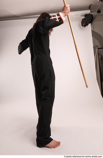 Man Adult Average White Fighting with spear Standing poses Coat