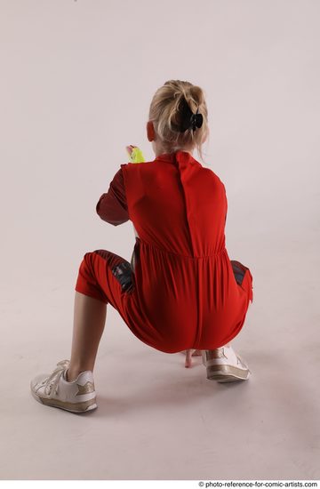 Woman Young Athletic White Fighting with gun Sitting poses Army