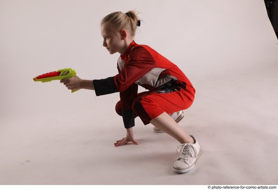 Woman Young Athletic White Fighting with gun Sitting poses Army