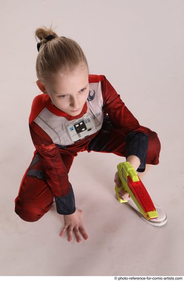 Woman Young Athletic White Fighting with gun Sitting poses Army