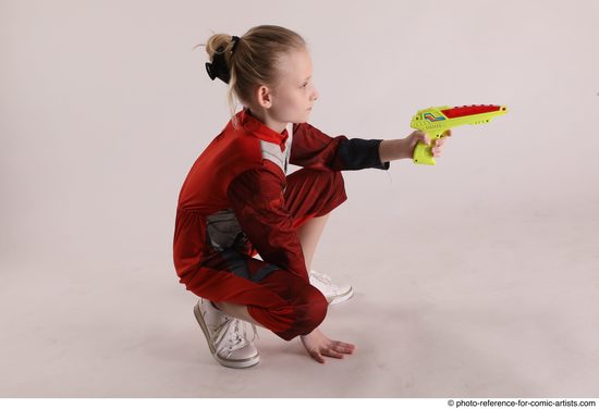 Woman Young Athletic White Fighting with gun Sitting poses Army